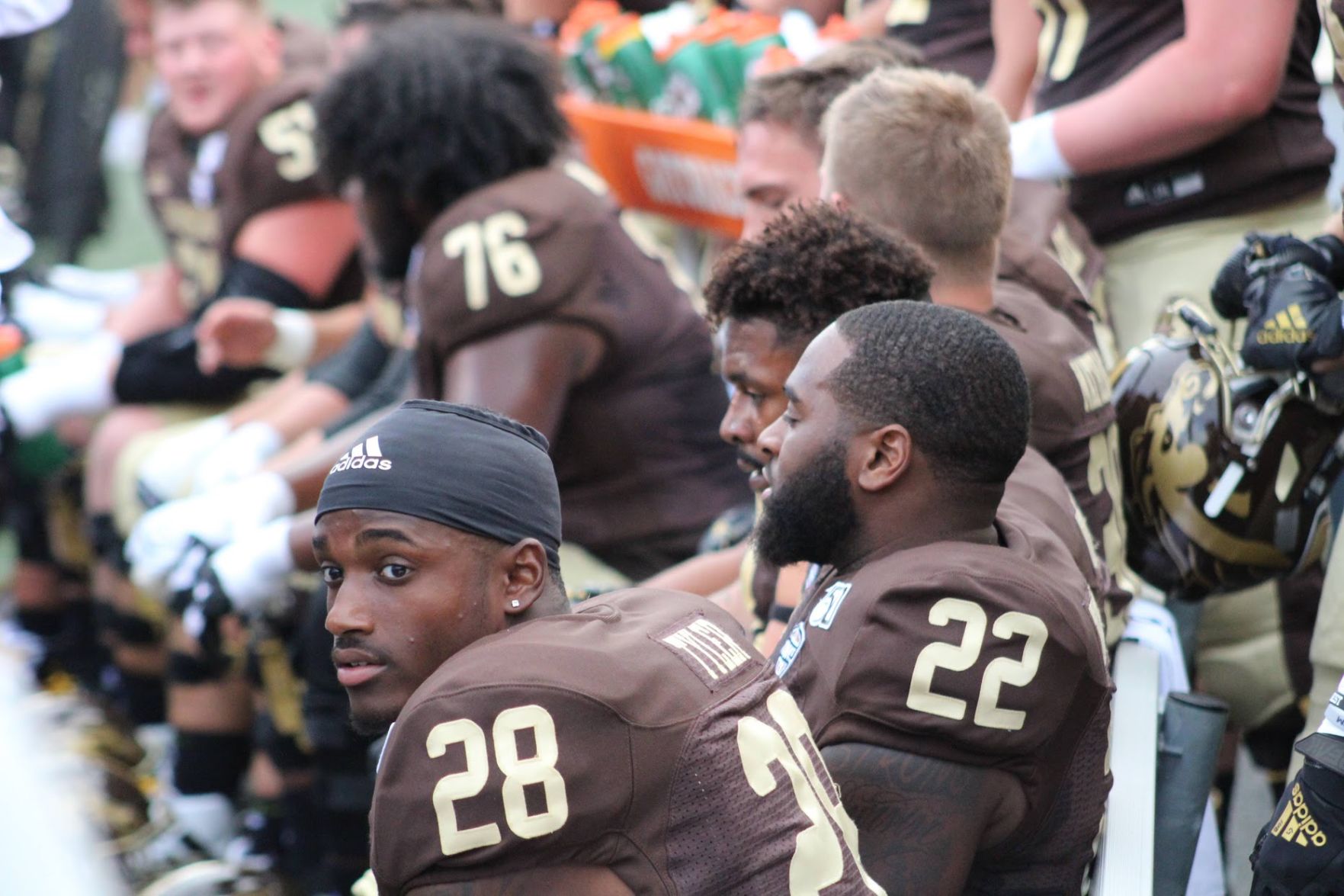 Freshman running back Sean Tyler watches as his team adds to their already impressive lead